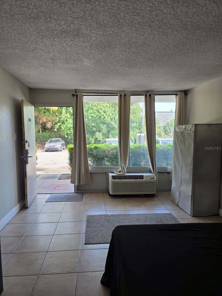 Photo of 7900 S Orange Blossom Trail #1055, Orlando, FL 32809 (MLS # O6436035)