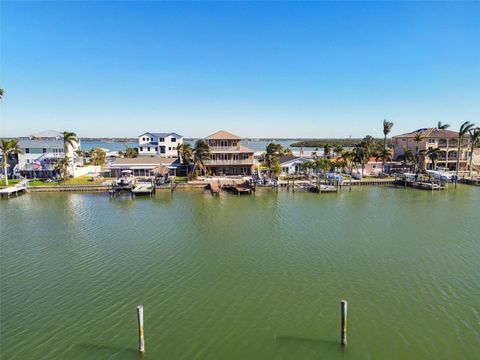 A home in MADEIRA BEACH