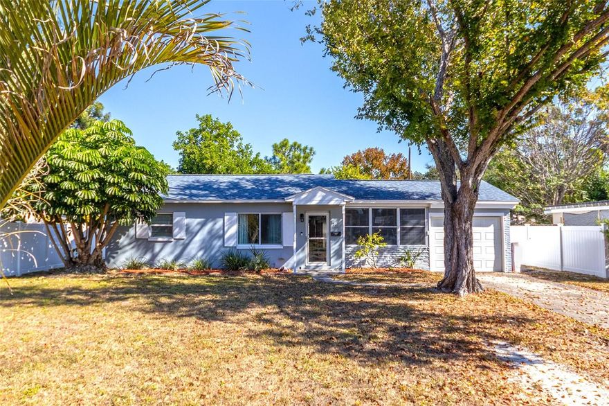 Welcome to effortless Florida living! This beautifully maintained 3-bedroom, 1-bath home offers the perfect blend of charm, comfort, and smart updates—all with NO HOA or CDD fees.

Step inside and enjoy a bright, open layout that feels warm and inviting. The versatile 3rd bedroom features elegant glass French doors, making it ideal for a home office, guest room, or flex space. A convenient pass-through window from the kitchen to the living area makes everyday living and entertaining simple.

Just off the kitchen, the 230 sq. ft. air-conditioned Florida room adds valuable additional living space—perfect for relaxing, hosting guests, or creating a sunny hobby room.

You’ll appreciate the attached 1-car garage.

Step outside to a large, fully fenced backyard featuring a new white privacy fence (2023), a good-sized storage shed, and plenty of room for pets, gardening, or backyard gatherings. A 20 ft. electric retractable awning with LED lights (2022) lets you enjoy the outdoors in comfort year-round.

This home has been thoughtfully updated so you can move in with peace of mind:

New roof – 2017

Carrier A/C & heating system with new ductwork, insulation, and smart thermostat – 2023

New hot water tank – 2022

New sewer lines – 2021

Many new windows – 2020

Granite countertops & wood plank porcelain tile flooring

The kitchen shines with granite countertops, solid wood cabinets (some with glass fronts), and a stainless-steel refrigerator & range. Tile flooring flows throughout the home, making it easy to maintain whether you're here full-time or seasonally. The 3rd bedroom’s Cedar Tongue & Groove ceiling adds a unique touch of Florida character.

Located minutes from shopping, restaurants, hospitals, Gulf Beaches, Downtown St. Petersburg, major highways, and the St. Pete Pier, this home puts everything you love about Florida within easy reach.

This is the perfect opportunity to own a move-in-ready home in a prime location. Don't miss it!