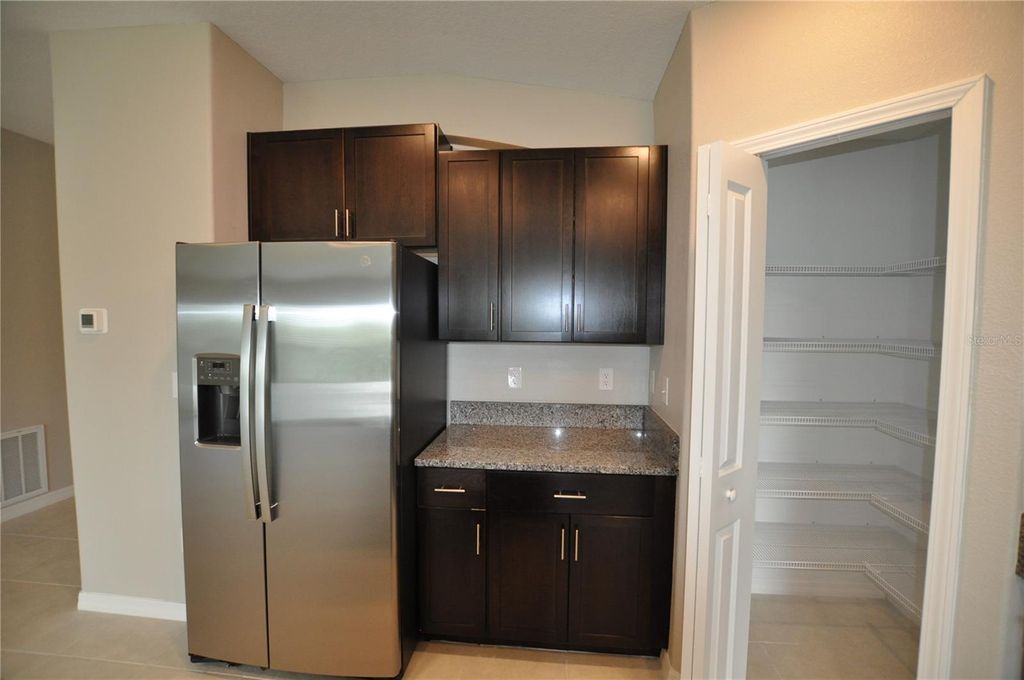 Photo of 1458 Tahitian Sunrise Drive, Plant City, FL 33565 (MLS # TB8490158)