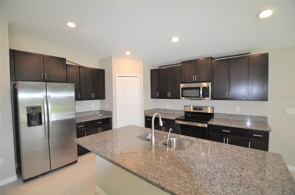 Photo of 1458 Tahitian Sunrise Drive, Plant City, FL 33565 (MLS # TB8490158)