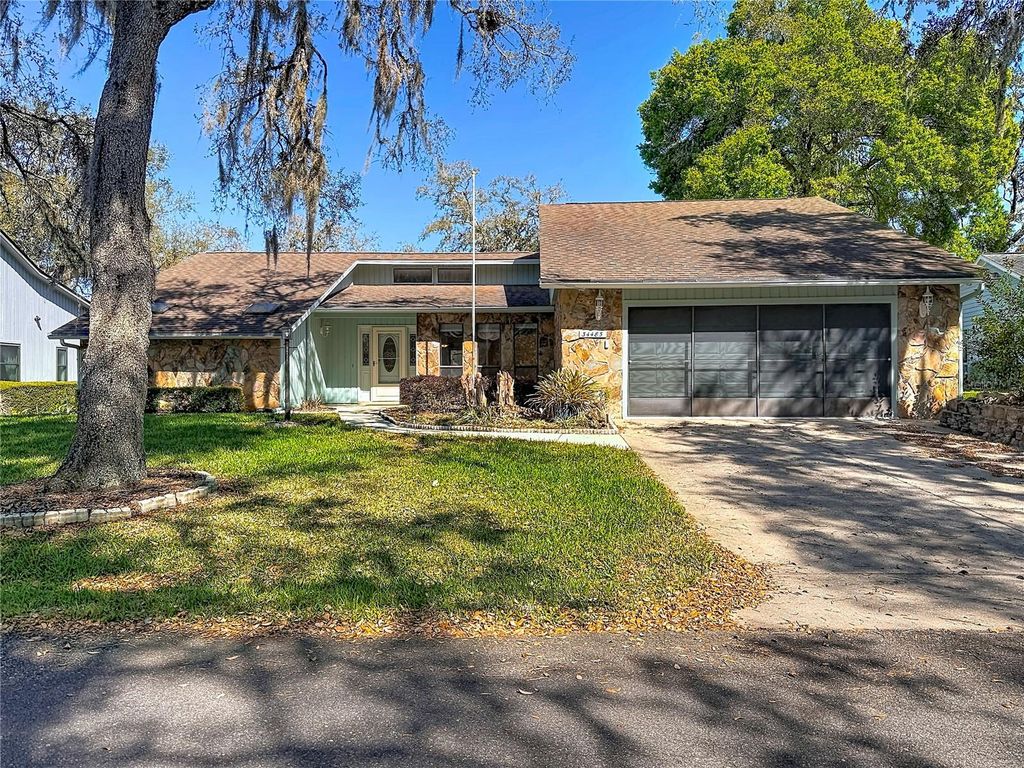 Photo of 34485 Cedarfield Drive, Dade City, FL 33523 (MLS # W7884038)