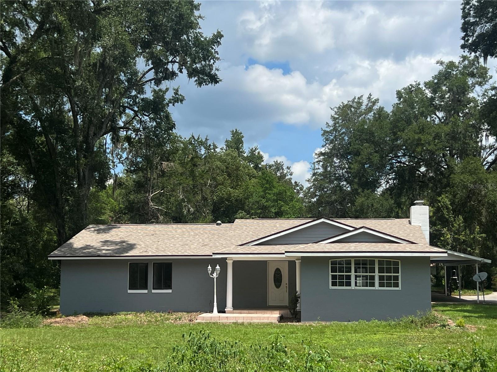 Welcome to a truly unique opportunity, this beautiful dual residence estate sits on just over an acre of private land down a quiet street in one of Ocala's most desirable areas. If you are looking for multi-generational living, income producing or just space to enjoy the outdoors this is it. Plenty of room for a pool, entertaining and parking for all your toys. Great investment with A1 zoning and has no HOA and no deed restrictions. Close to shopping, dining, and entertainment all just a short drive away and surrounded by high end homes so will increase in value over time. Schedule your showing today.