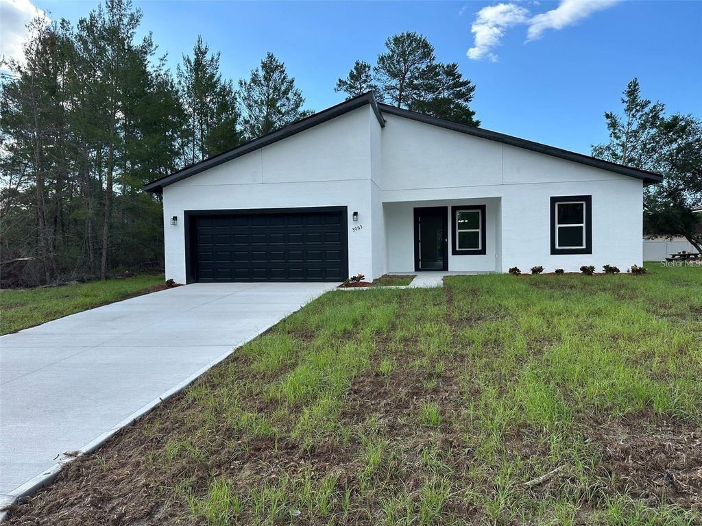 Photo of 3063 SW 168th Loop, Ocala, FL 34473 (MLS # O6352833)