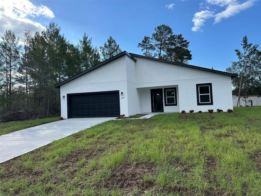 Photo of 3063 SW 168th Loop, Ocala, FL 34473 (MLS # O6352833)