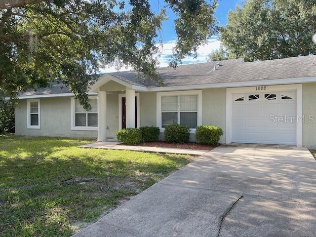 Lovely 3 bedroom, 2 bath home in Deltona with tile flooring throughout for easy care and a fresh look. Enjoy a 1-car garage, spacious living areas, and a peaceful setting on a quiet street while still being close to major roadways. No pets, please.