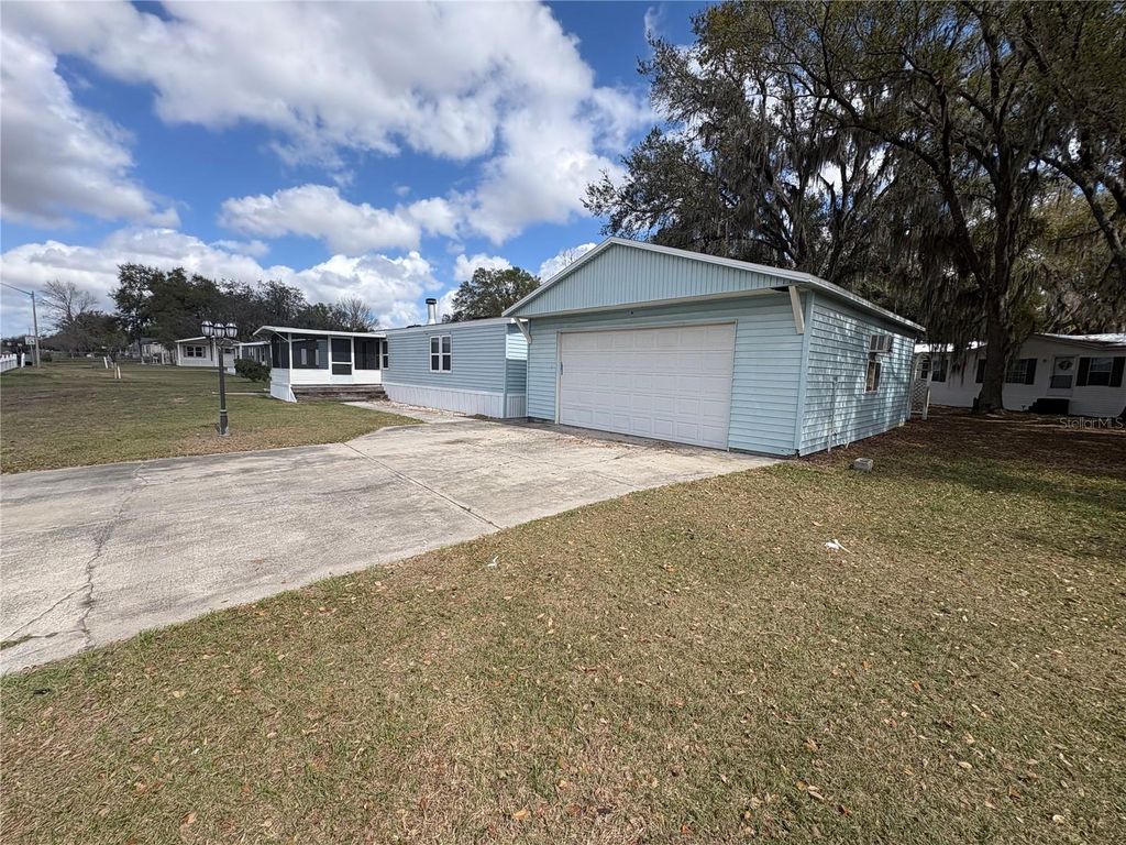 Photo of 4831 Rollinglen Loop W, Lakeland, FL 33810 (MLS # B4902201)