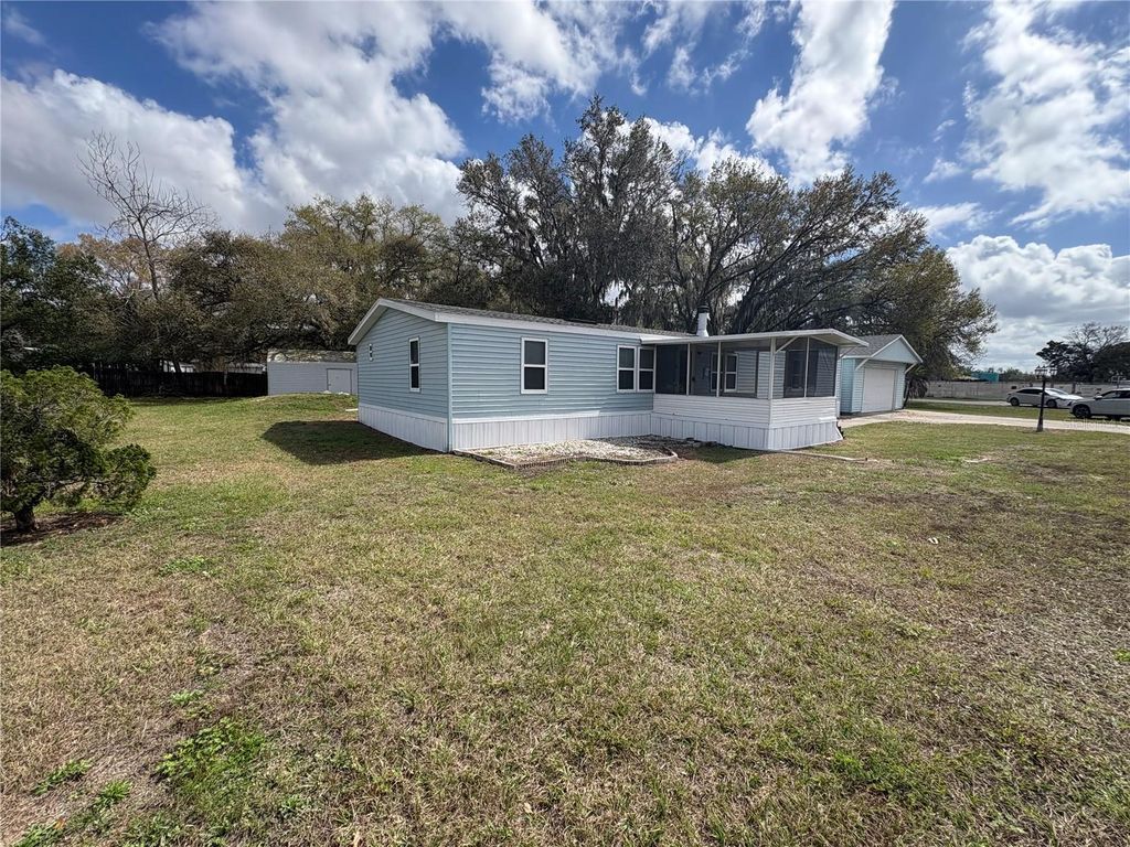 Photo of 4831 Rollinglen Loop W, Lakeland, FL 33810 (MLS # B4902201)