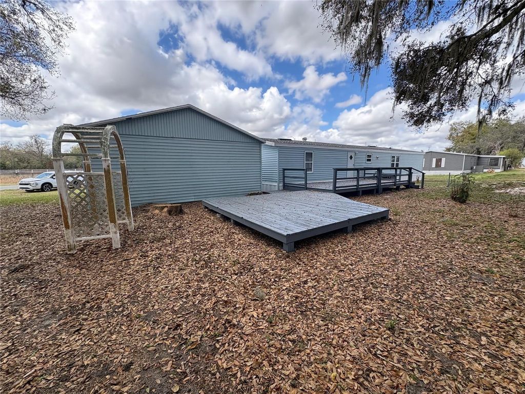 Photo of 4831 Rollinglen Loop W, Lakeland, FL 33810 (MLS # B4902201)