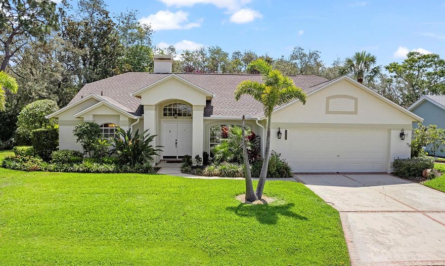Tucked inside the sought-after Oakwood Golf Community in Lake Wales, this beautifully maintained and thoughtfully updated 3-bedroom, 2-bathroom home offers the kind of move-in-ready comfort buyers are hoping to find—but rarely do. Set on a manicured lot surrounded by mature landscaping, the property immediately welcomes you with curb appeal and continues to impress once inside.

Vaulted ceilings and abundant natural light create an airy feel throughout the home, while the well-designed split floorplan provides the perfect balance of openness and privacy. The spacious primary suite is privately positioned on one side of the home and features sliding glass doors that lead directly out to the screened lanai and pool, giving you a peaceful retreat with effortless indoor-outdoor living. A beautiful passthrough wood-burning fireplace connects the primary suite and living room, adding warmth, charm, and character to both spaces.

The main living areas flow seamlessly into an updated kitchen designed for both everyday living and entertaining. Highlights include Corian countertops, a newly installed backsplash and sink, and nearly all appliances replaced within the last year. Luxury vinyl plank flooring runs throughout the entire home, complemented by fresh interior paint completed within the last year and a half. Updated lighting, modern hardware, and ceiling fans in every bedroom and throughout the outdoor living space add to the home’s polished and cohesive feel.

Step outside and discover the true highlight of the property — an expansive screened lanai and pool area designed for relaxing and entertaining. The covered patio is wired for surround sound and includes a mounted outdoor television that stays with the home, creating the perfect setup for gatherings or quiet evenings by the pool. The second bathroom conveniently serves as a pool bath with direct lanai access.

The home also offers several valuable upgrades and smart features, including a sprinkler system on its own well with a brand-new pump and app-controlled operation. A new pool pump, freshly cleaned gutters, and recent exterior power washing ensure the home is just as well cared for outside as it is inside. Major systems provide additional peace of mind with a roof and water heater only four years old and a UV light installed in the AC system to help improve indoor air quality. The entire home is also wired for surround sound.

Location is another standout feature, placing you just 15 minutes from local shopping and dining, about 30 minutes from Legoland, and roughly 90 minutes from Tampa, Orlando, and the world-famous Disney theme parks. Many furnishings are negotiable outside of the sale, creating a rare opportunity for buyers looking for a truly turnkey home.

Homes this well maintained with a private pool, thoughtful upgrades, and a location in the Oakwood Golf Community don’t stay available for long. Schedule your private tour and experience this move-in ready home for yourself!