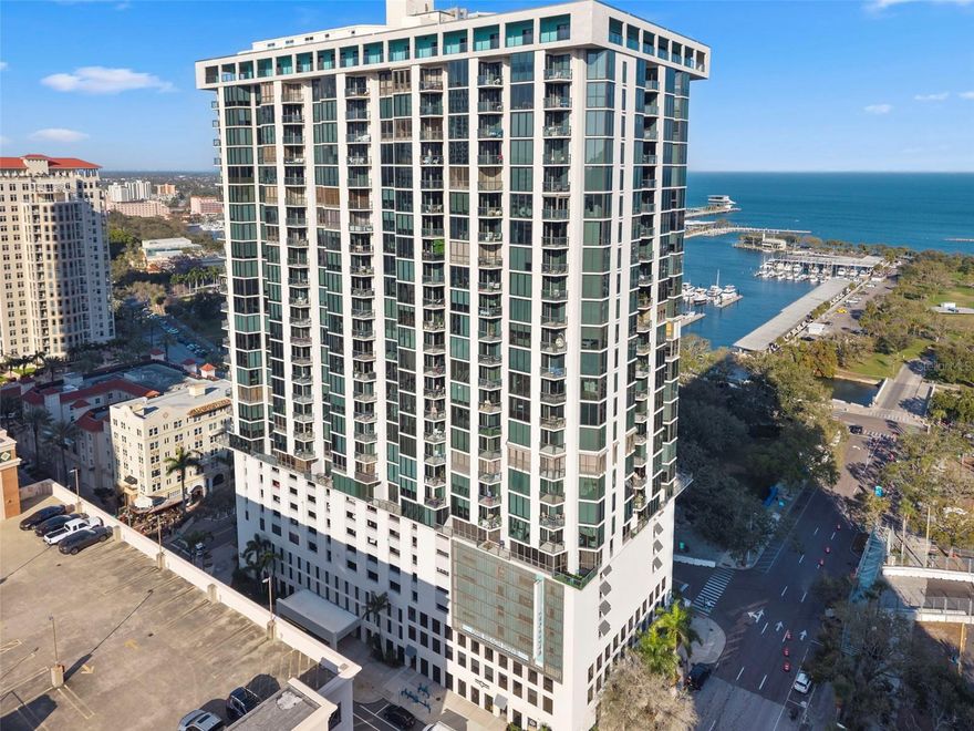 Welcome to Unit 1109 at the iconic Bayfront Tower, ideally positioned along prestigious Beach Drive in the heart of Downtown St. Petersburg. This 1 bedroom 1.5 bathroom residence offers sweeping city views from an elevated vantage point, with expansive windows that flood the home with natural light. The open-concept layout creates a seamless flow between the kitchen, dining, and living areas — ideal for both everyday living and entertaining. Sellers have already paid for new windows to be installed. 

Recent enhancements include electric window shades, removal of popcorn ceilings for a clean, modern finish, and an updated bathroom featuring a walk-in shower in place of the original tub. The spacious primary suite offers comfort and generous walk in closet space, while the kitchen provides ample cabinetry and prep space. Residents enjoy resort-style amenities including 24-hour concierge and security, a rooftop pool and fitness center, club and entertainment rooms, valet and secure parking — all just steps from the St. Pete Pier, waterfront parks, marinas, museums, and the best dining along Beach Drive.