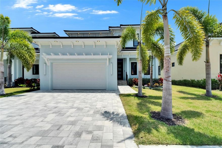 6530 Simone Shores Circle | Custom Bistro Builders Design
7 Beds | 5 Baths | 3,967 Living Sq. Ft. | 12 ft Elevation
Welcome to 6530 Simone Shores Circle, a newly completed 2024 custom waterfront home by Bistro Builders in Apollo Beach. This two-story, block-constructed home offers 7 bedrooms, 5 full bathrooms, Butlers Pantry, a dedicated movie theater room, and nearly 4,000 sq. ft. of living space. Built on a 12-foot elevation with a stem wall foundation and cement flooring between stories, the home is engineered for strength, safety, and long-term efficiency. It features solid block construction on both floors, hurricane-rated impact windows, seamless fire-resistant doors, spray foam insulation, and hurricane-rated insulated garage doors. The garage includes a dedicated AC system and multi-layer epoxy flooring for durability and comfort.
Designed with smart home technology throughout, the home allows full control of the solar system, lighting, security, climate, garage, and pool from your phone or the mounted iPads. Entry is secured with fingerprint and facial recognition. Programmable soffit, baseboard, and window lighting is installed inside and out, with built-in surround sound throughout the home, lanai, and garage.
Inside, the main living area features 24-ft soaring ceilings, smooth finish walls, triple sliding Hurricane Rated Impact glass doors, and a large open great room with an electric fireplace and custom lighting. The kitchen includes quartz countertops, a waterfall island, a gas stove with pot filler, wine cooler, walk-in pantry, and European-style custom cabinetry with pull-down and organizational shelving. A separate butler’s prep kitchen offers extra space for entertaining, prep work, and storage.
The primary suite and a second bedroom are located on the first floor. The primary suite features canal and pool views, direct lanai access, a walk-in closet with a European organization system, and a spacious bathroom with dual sinks, a jetted soaking tub, and a floor-to-ceiling tiled shower with multiple heads that allow color and pressure customization. Upstairs includes five additional bedrooms with custom closets and access to a relaxing balcony. A second laundry room with cabinetry and a folding station is also upstairs.
The outdoor living space includes a covered lanai with a custom outdoor kitchen and grill, a heated saltwater pool and spa, and a new seawall with a private dock and 10,000 lb lift offering direct Tampa Bay access. The home includes a paver driveway and lawn maintenance is covered by the low monthly HOA. Located in Hemingway Estates, a high-elevation community that remained dry during recent major storms, this home combines space, technology, security, and premium waterfront access for modern Florida living.