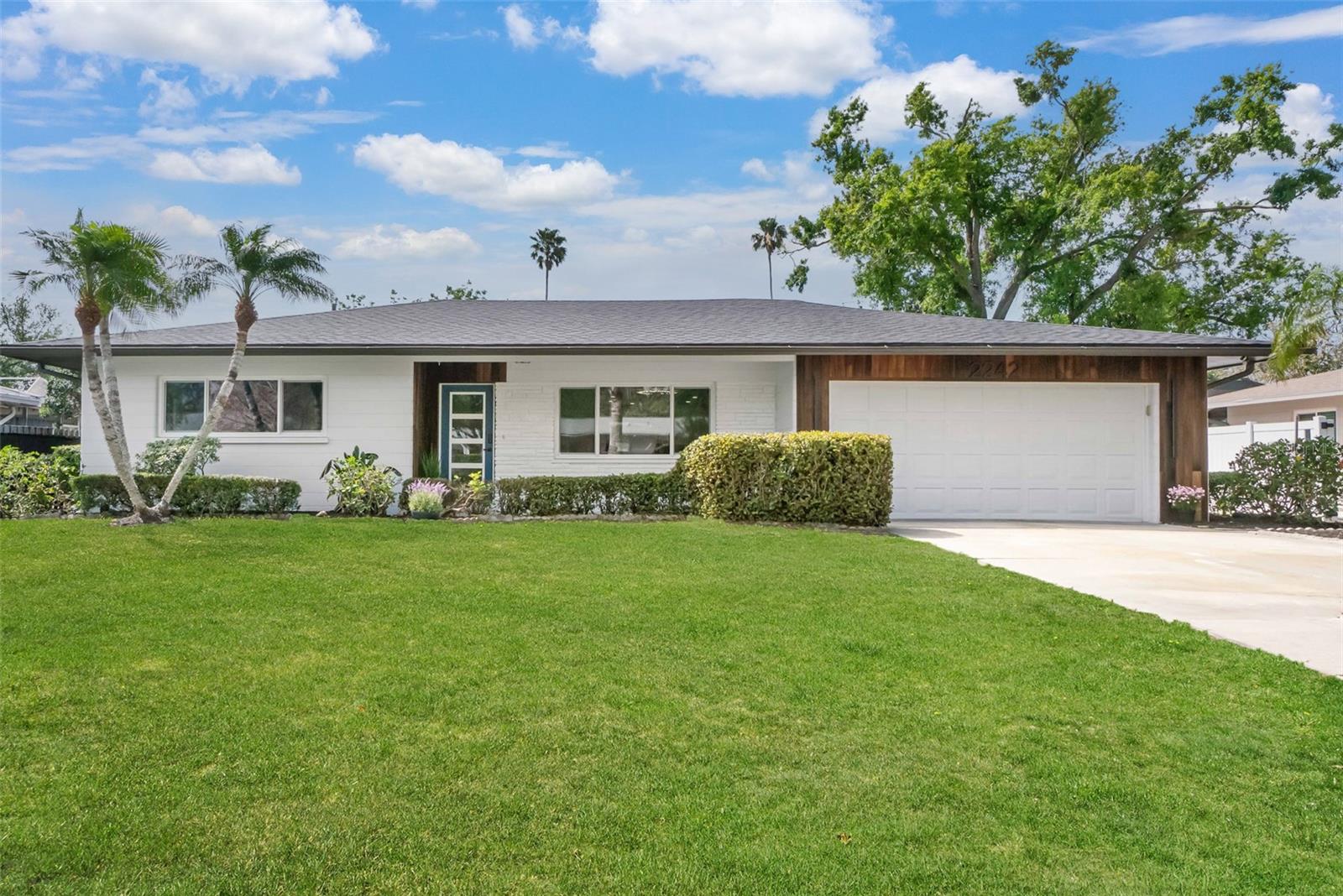 One or more photo(s) has been virtually staged. Back on market! The buyer had to back out, but their loss is your gain! Nestled in the heart of the highly sought-after Southgate neighborhood, this mid-century modern 3-bedroom, 2-bathroom pool home has been completely remodeled with meticulous attention to detail and the finest quality materials. This beautiful home withstood the recent major hurricanes with no flooding or damage! Enjoy peace of mind with ALL NEW HURRICANE IMPACT WINDOWS and a NEW ROOF, both installed in 2025. As you step inside, you'll be captivated by the spacious open floor plan and gourmet kitchen. The heart of this home is undoubtedly the custom chef's kitchen, featuring custom wood cabinetry, stunning quartz countertops, and high-end Café series appliances, including a double oven with True Convection and air fry options. You can even control your oven from any room in the house using your smartphone with Wi-Fi Connect, perfect for chefs of any skill level. Entertain your guests in the expansive fenced yard and 32-foot pool (yes, 32 feet!). With no HOA fees, you have the freedom to plant your own fruit trees and create your very own backyard tropical oasis. Situated less than one mile from the renowned Sarasota Memorial Hospital (SMH), Arlington Park, and just minutes from Siesta Key Beach, this friendly neighborhood offers the perfect location for all of your needs! Call to schedule your showing today. This showstopper will not last!