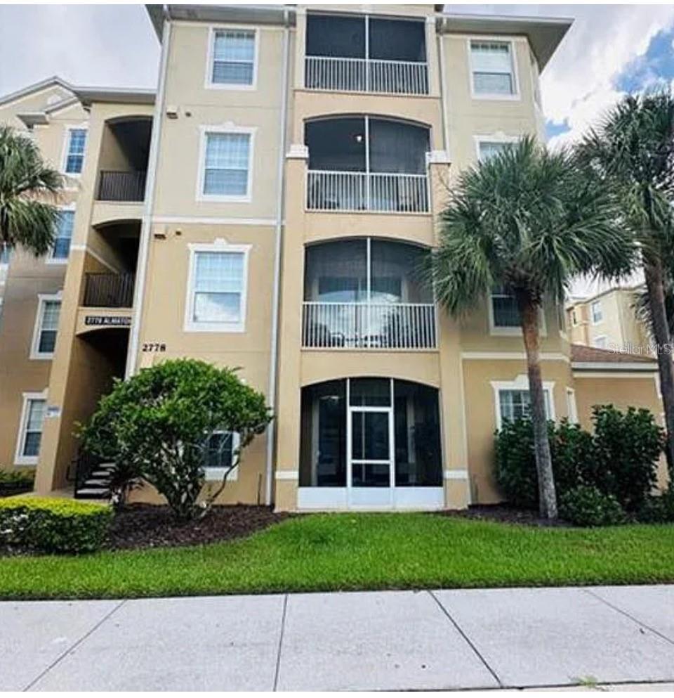 Photo of 2778 Almaton Loop #303, Kissimmee, FL 34747 (MLS # O6413616)