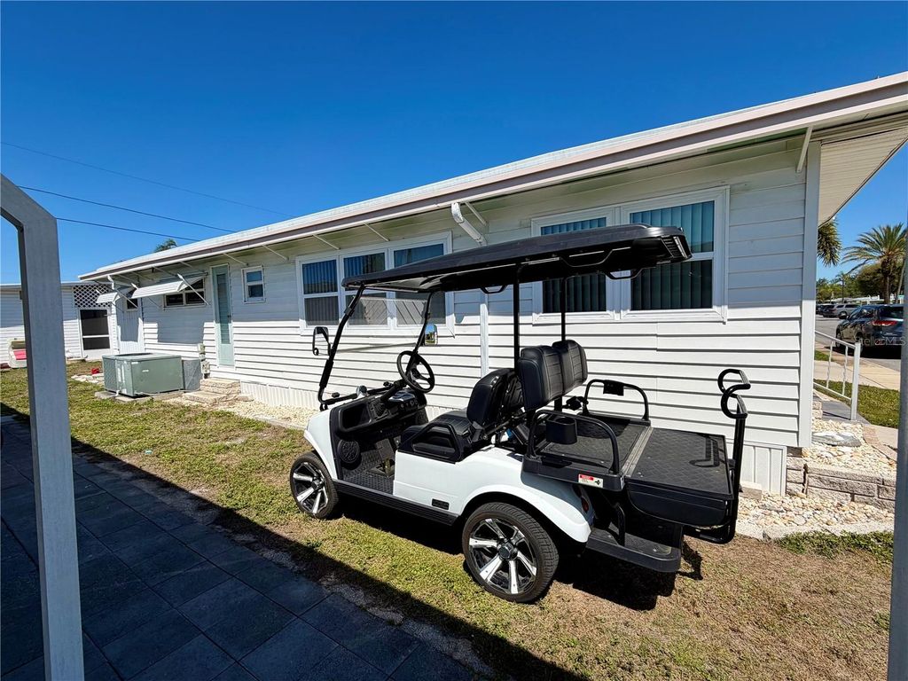 Photo of 34098 Cherry Drive N, Pinellas Park, FL 33781 (MLS # TB8488644)