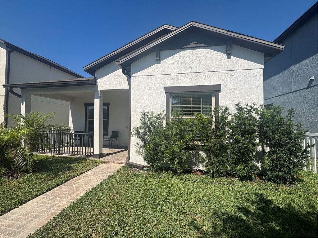 Photo of 9601 Flourish Drive, Land O Lakes, FL 34637 (MLS # TB8508202)