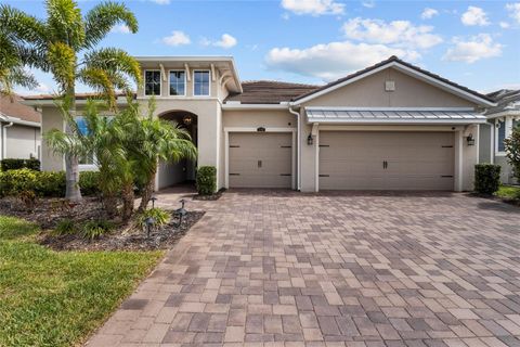 Photo of 5745 Long Shore Loop, Sarasota, FL 34238 (MLS # A4686023)