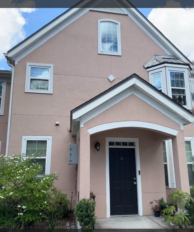 Fall in Love with this beautifully updated 2-bedroom, 2-bath villa with an attached one car garage in the desirable 24- hour guarded community of Hamptons at MetroWest. The community has it all - location, lifestyle, and low-maintenance living! Inside you'll find a spacious layout that provides comfortable living and entertaining. Perfect as a primary, seasonal or vacation rental investment, this first floor unit has tile floor throughout the living area, bay window in the living room, a huge pantry that gives you more space for kitchen items or storage needs. The heart of the home is the kitchen, featuring newly upgraded granite countertops, 42" solid wood cabinets (newly installed in 2024), a breakfast bar, cozy dinette, and modern appliances! The primary suite provides a walk-in closet and an ensuite bath with shower. A new AC and water heater installed in 2021. Outside, enjoy resort-style community amenities like two community swimming pools, athletic club, business center, fishing dock and beach area, and a large/fully equipped 24-hour gym - all included in the HOA fee. Just minutes from Disney, I-4 , Outlet Mall, Mall at Millenia, and Universal Studios, you're perfectly situated to explore all of Central Florida's top destinations and attractions. Don’t miss this opportunity to own a piece of the Florida lifestyle. Come see it today and discover your dream home in the highly desirable MetroWest area!