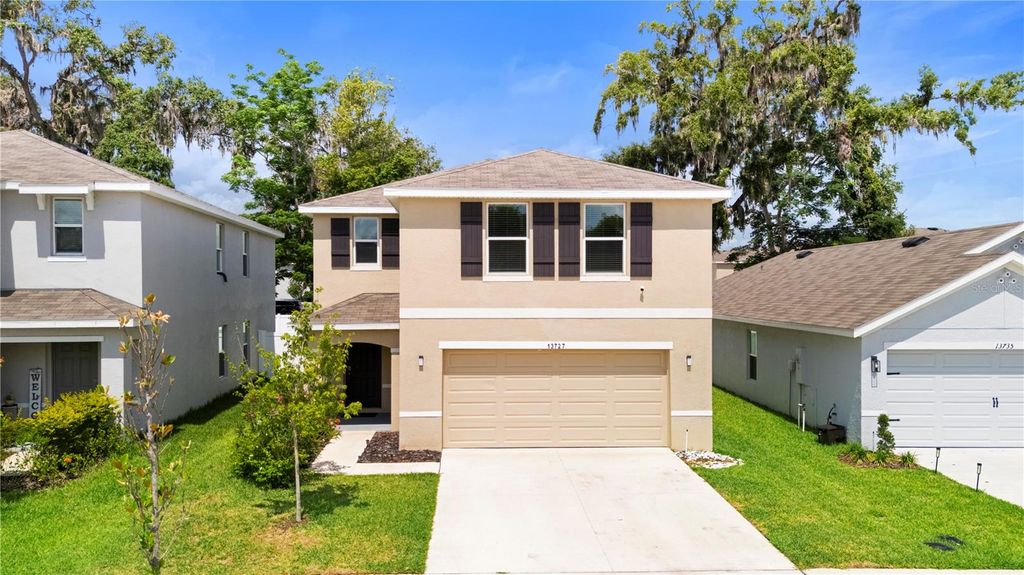 Photo of 13727 Whiskey Daisy Drive, Dade City, FL 33525 (MLS # TB8388468)