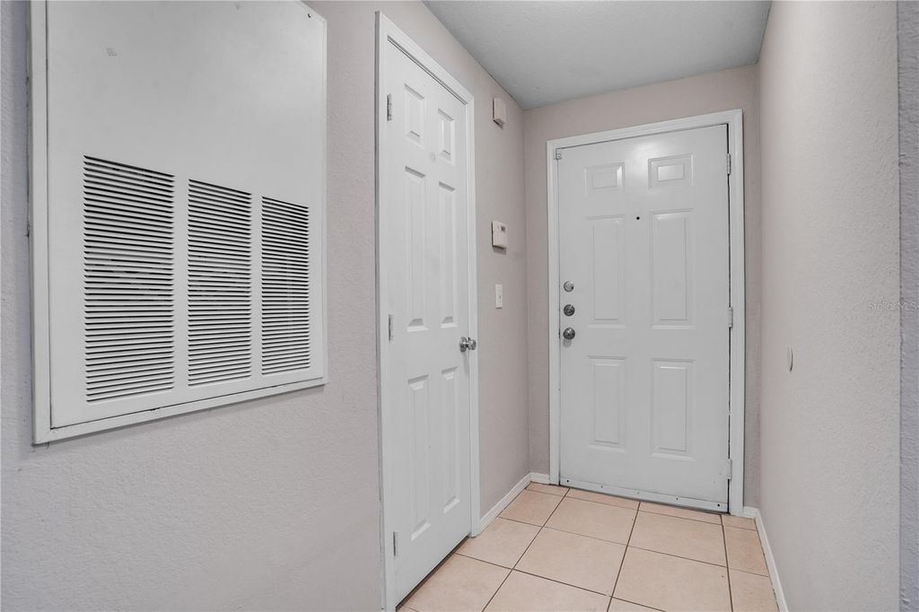 Photo of 13113 Sanctuary Cove Drive #103, Temple Terrace, FL 33637 (MLS # TB8430741)