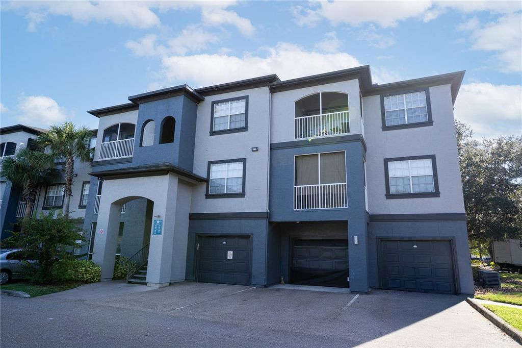 Photo of 13113 Sanctuary Cove Drive #103, Temple Terrace, FL 33637 (MLS # TB8430741)