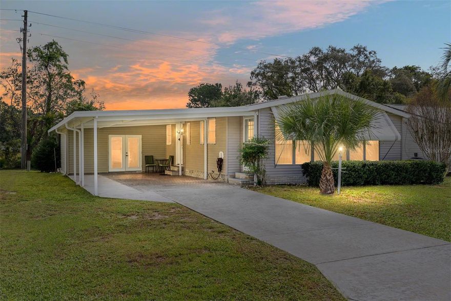 Welcome home to this charming 2-bedroom, 2 bath manufactured home in the Village of Orange Blossom Gardens! With over 1,300 square feet of living space and no homes behind, you’ll love the peaceful privacy this property offers. Step inside to an open floor plan that feels warm and inviting from the moment you enter. The kitchen has plenty of cabinet and counter space and opens up nicely to the dining and living areas, perfect for everyday living or entertaining guests. Both bedrooms are spacious with walk-in closets, and the primary suite features its own private bath. UPDATED windows (2014), HVAC (2014). Relax and unwind in the screened lanai overlooking the quiet backyard, a great spot to enjoy your morning coffee or evening breeze. Located just minutes from Spanish Springs Town Square, you’ll be close to shopping, dining, golf, and all the fun The Villages is known for!