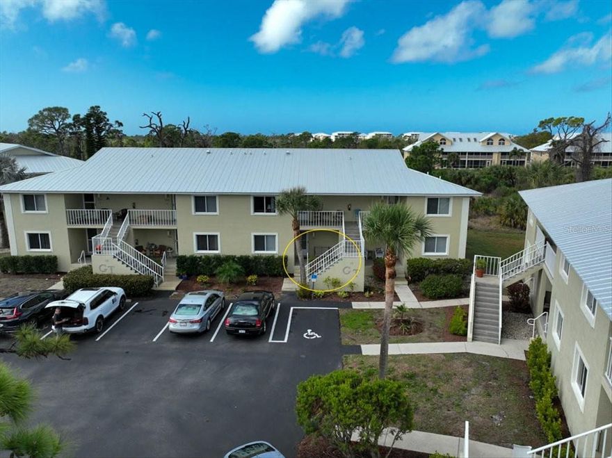 FULLY FURNISHED & TURN-KEY! Welcome to this beautifully maintained first-floor condo featuring 2 bedrooms, 2 bathrooms, and an open-concept layout perfect for everyday living and entertaining. Offered fully furnished, this home creates a relaxed coastal Florida feel throughout.

Enjoy peaceful mornings and breathtaking sunset views from the large screened lanai overlooking the 80-acre Wildflower Preserve, surrounded by mature trees, birds, and natural Florida wildlife—your own private retreat.

This unit also includes a carport, a valuable feature not included with all condos in the community. The community has recently completed new metal roof installations for added peace of mind.

Located in the highly desirable Golden Tee community, residents enjoy access to a heated pool, pavilion, and tennis courts, along with nearby walking trails, fishing estuaries, and biking paths. Conveniently located close to beaches, shopping, dining, and everyday amenities.

Move right in and start enjoying the Florida lifestyle today—make Golden Tee your new home!