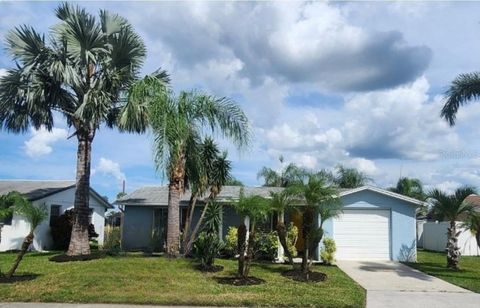 Photo of 2228 Society Drive, Holiday, FL 34691 (MLS # TB8423721) Photo of 2228 Society Drive, Holiday, FL 34691 (MLS # TB8423721)