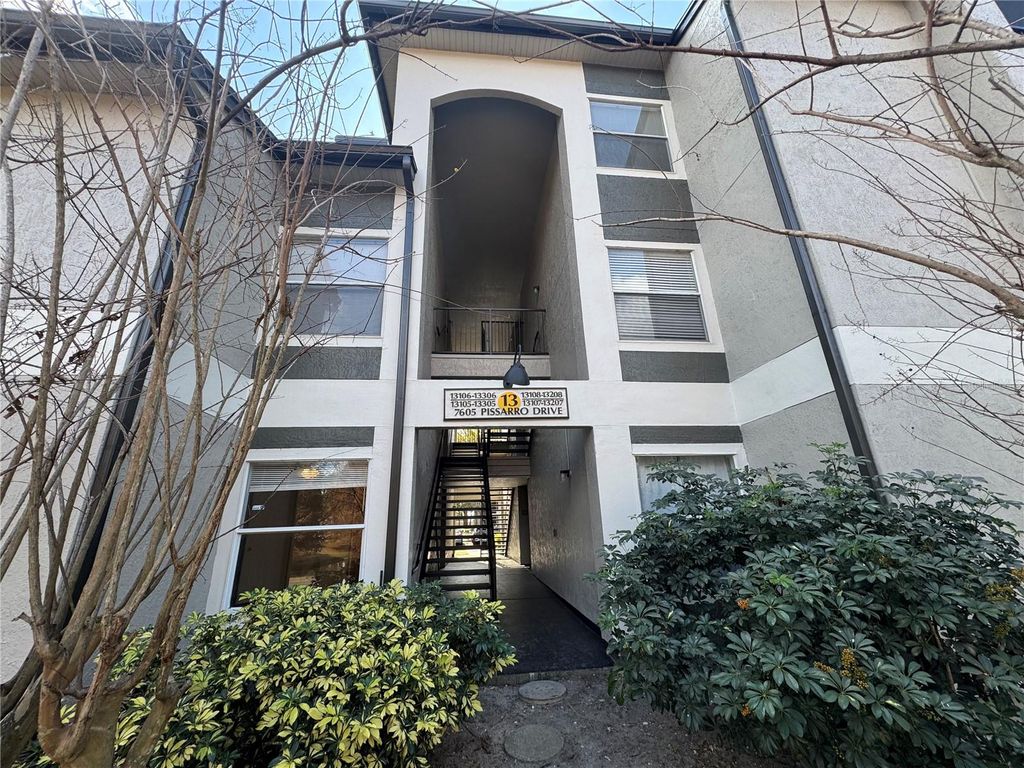 Photo of 7605 Pissarro Drive #13108, Orlando, FL 32819 (MLS # O6371609)