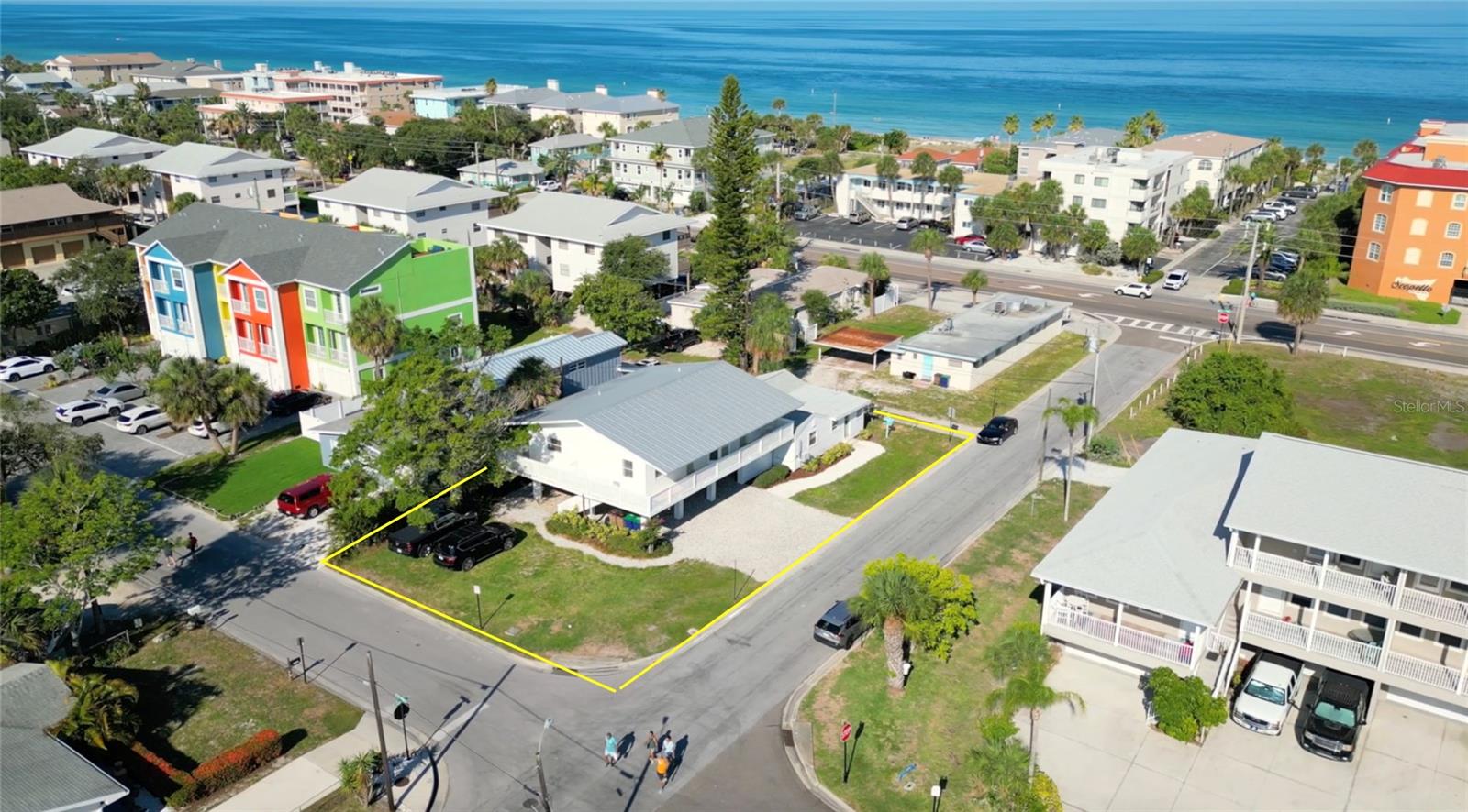 Located just minutes from USA Todays 2023 winner of "The Best Beach in the South". Incredible opportunity to own this 3 Unit, beautifully renovated, fully furnished from Crate and Barrel, Pottery Barn and West Elm vacation rental property in the highly sought after beach community of Indian Rocks Beach, Florida. Indian Rocks Beach is a thriving Gulf front community with a quintessential Florida vibe Indian Rocks Beach supports a lively mixture of dining and recreational activities. From the Nature Preserve to the parks, to their white sandy shores, you'll find a smile on every face, and a warm Florida welcome with everyone you meet.
Located just steps from the beach this home welcomes both investors and vacationers. Indian Rocks Beach is one of Pinellas Counties only gulf beach communities with no rental restriction, welcoming vacation renters from around the world.
The property features three unique living spaces. The main building, a raised duplex, houses unit one and two. A Large wrap around balcony incases both units, allowing for guests to enjoy a beautiful water view of the sunrise and sunset. Unit one is a spacious two-bedroom, one bath with high cathedral ceilings and open floor plan with a full service eat-in kitchen and large family room with built in entertainment center. Unit two is a beautiful one bedroom, one bathroom with large open family room and efficiency kitchen. The living spaces can be adjoined creating a three-bedroom two-bathroom suite or may be used separately.
Unit three is a charming beach cottage featuring two-bedrooms and one bath. A stunning kitchen and dry bar with ample counter and storage space greets you upon arrival. All three units are custom designs with all matching finishes to give guests that boutique hotel feeling. Calacatta gold countertops, custom hardwood cabinetry and new stainless-steel appliances incase all three fully stocked kitchen spaces, complete with coffee bars and Keurig machines. Bathrooms all have custom vanities with Delta gold plumbing and trim fixtures, hotel style custom glass shower doors and fully stocked bath and bed linens. Each bedroom is equipped with Queen Sofa sleepers and UBS charging nightstands with bedside lamps. 60-inch TV’s, a nest thermostat, new mini split AC units, a newly removed laundry room with new washer and dryer and new stacked washer and dryer for the cottage, premium scratch resistant waterproof flooring, all newly painted interior and exterior, new siding, and sliders and custom window treatments are just a few of the luxurious upgrades. New patio pavers, outdoor dining with attached grilling station and beach supplies, sports equipment, fishing poles and wagons are all ready for your enjoyment. This is a must-see property, ready to generate income and create unforgettable memories for its guests!