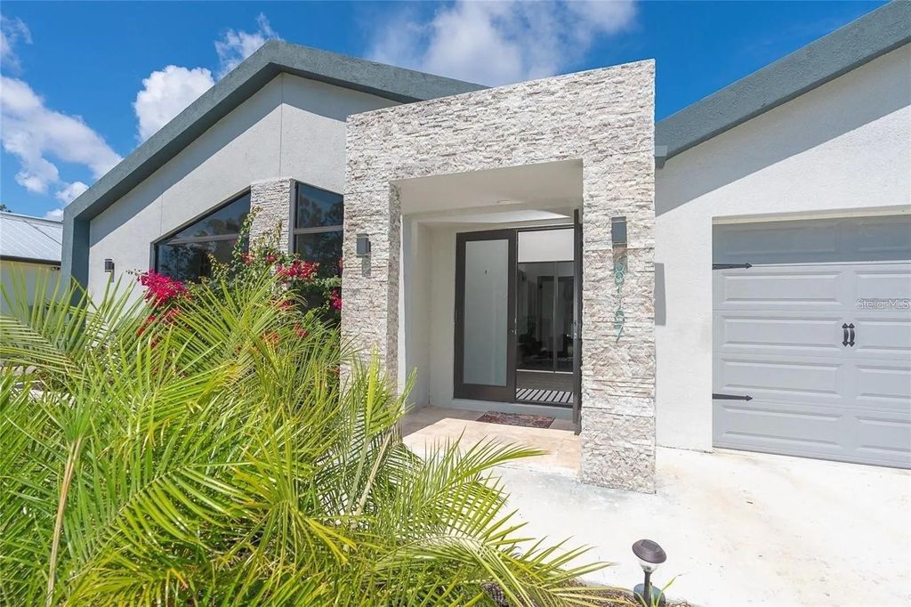 Photo of 8167 Dittmar Street, Port Charlotte, FL 33981 (MLS # C7514968)