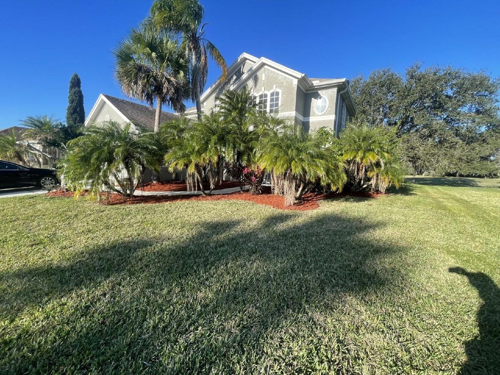 Photo of 1565 The Oaks Boulevard, Kissimmee, FL 34746 (MLS # O6449512)