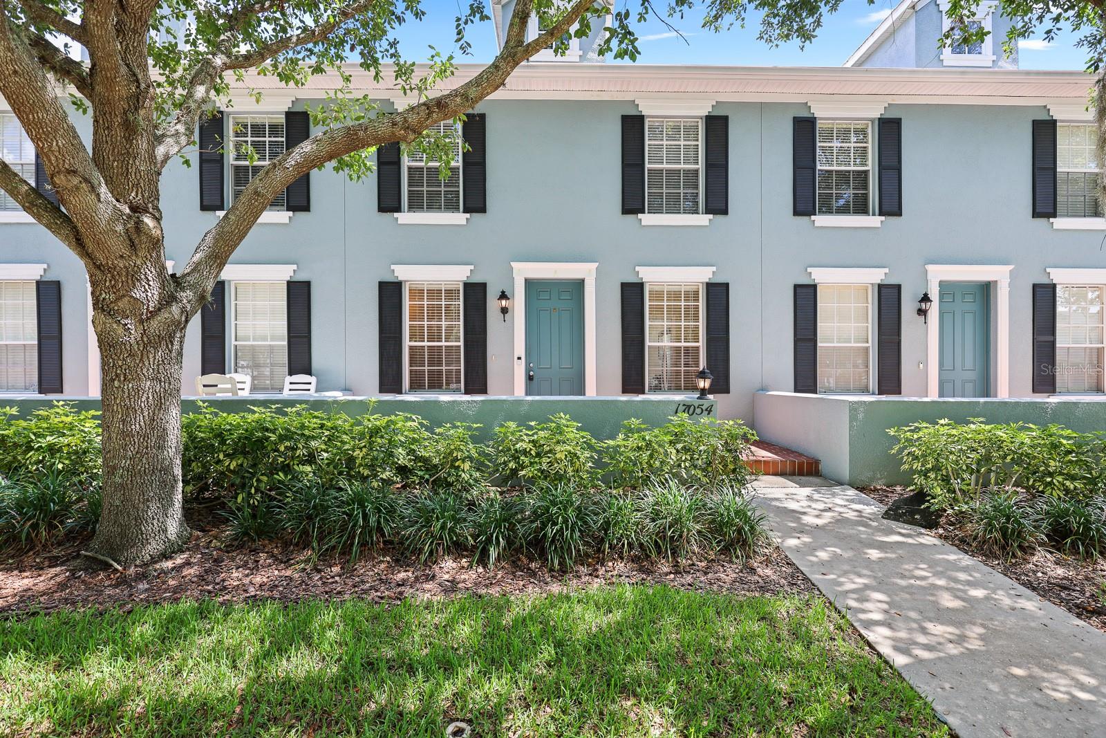 Nestled in the heart of FishHawk Ranch’s sought-after Garden District, this charming 3-bedroom, 2.5-bath townhome with a detached 2-car garage blends comfort, convenience, and community. Just a short distance to Park Square, the Aquatic Club, and top-rated schools, this home is perfectly situated to enjoy the best of FishHawk living.
Step inside to discover a light-filled family room with sliding glass doors that open to a private screened lanai—an ideal spot for relaxing or entertaining. The kitchen is equipped with a gas range, microwave hood, dishwasher, and refrigerator, and is conveniently located next to the laundry room with washer and dryer hookups. A separate dining room features both a coat and storage closet, while a half bath completes the first floor.
Upstairs, the spacious primary suite offers a large walk-in closet, and an en-suite bath with dual sinks and a walk-in shower. All three bedrooms include vaulted ceilings and ceiling fans for added comfort. Stylish new laminate flooring enhances the living and dining areas, while the kitchen and wet zones are finished with durable tile. Plush carpet keeps the upstairs cozy and quiet. Enjoy evenings on the large front porch or unwind on the screened lanai—all without the hassle of yard work, as lawn care is included in the rent. FishHawk Ranch offers an unbeatable lifestyle with over 25 miles of trails, an Aquatic Center with an Olympic-size pool, splash park and water slide, fitness center, sports courts, playgrounds, and more. This is more than a home—it’s a way of life.