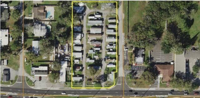 Established HIGH income-producing Mobile Home/RV Park SELLER FINANCING OPTION in a prime, centrally located, high traffic area of Tampa, FL. The property is zoned as Commercial/RSC 6, encompassing 1.8 acres. It currently operates as an adult-only park with a maximum of two person per household and no pets allowed. The park has been under the same ownership since 2001 and is recognized for its long-term, detailed management, offering a highly efficient and profitable HIGH INCOME stream.
The park features 33 rental lots, with a well-maintained on-site laundromat for tenant convenience and additional income. Due to its reputation and stable environment, the park boasts rare vacancies, with many tenants having lived on the property for an average of 5-10 plus years. This makes it an attractive, low-maintenance, high income investment for those looking for a steady income in a desirable location of Tampa FL. Tenants individually metered for TECO electric, on City of Tampa Water. Location about 20 minutes from Tampa International Airport, Tampa Stadium, Downtown Tampa and a few miles to Walmart and many restaurants.