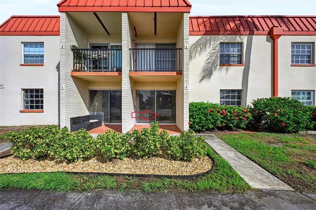 Photo of 10365 Paradise Boulevard #5, Treasure Island, FL 33706 (MLS # TB8560487)