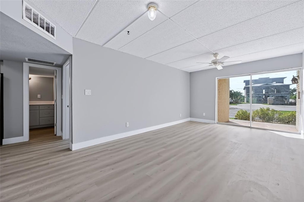 Photo of 10365 Paradise Boulevard #5, Treasure Island, FL 33706 (MLS # TB8560487)