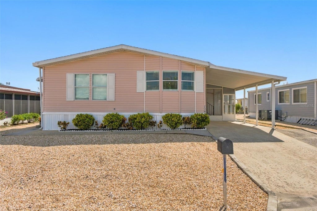 Photo of 7318 Grand Pine Drive, Hudson, FL 34667 (MLS # TB8558372)
