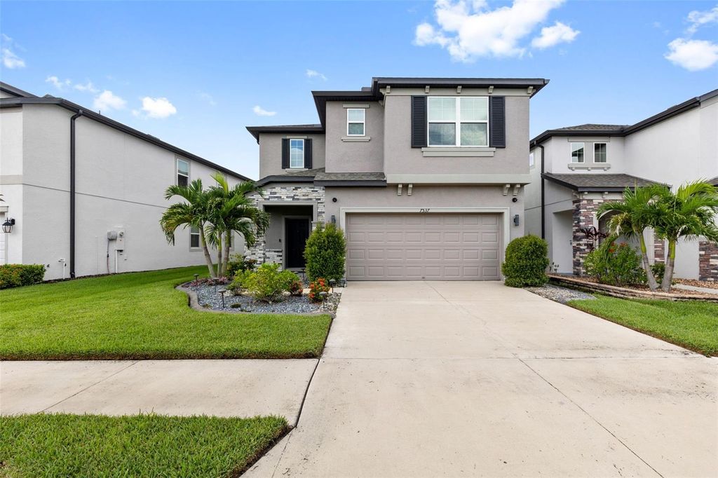 Photo of 7537 Pool Compass Loop, Wesley Chapel, FL 33545 (MLS # TB8421132)