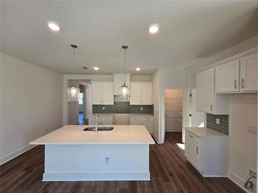 Photo of 3352 Daybreak Run Loop, Spring Hill, FL 34609 (MLS # R4911987)