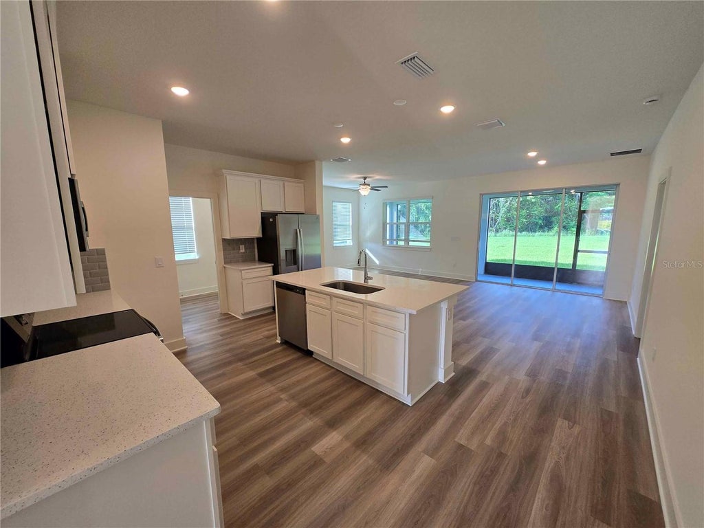 Photo of 3352 Daybreak Run Loop, Spring Hill, FL 34609 (MLS # R4911987)