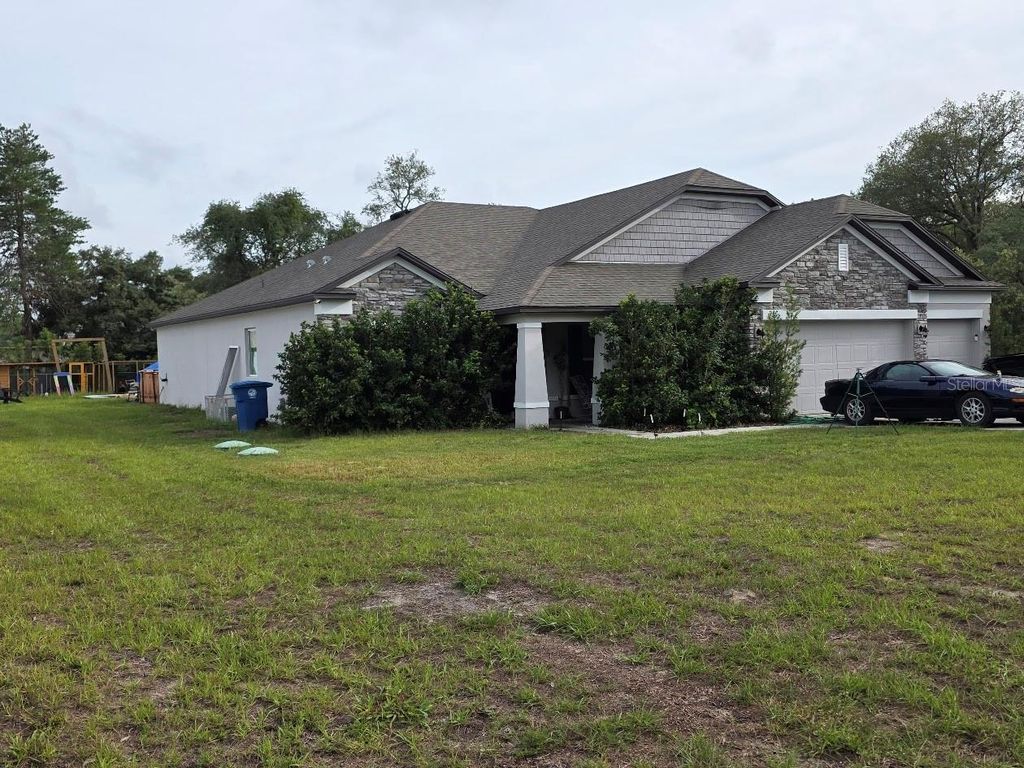 Photo of 11392 Mississippi Kite Avenue, Brooksville, FL 34614 (MLS # TB8519293)