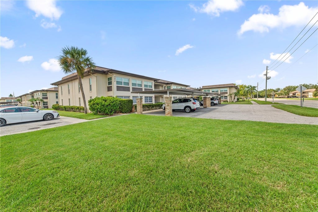 Photo of 4854 Marine Parkway #101, New Port Richey, FL 34652 (MLS # A4704709)