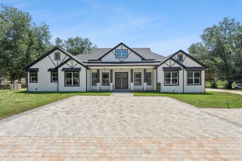 Photo of 7739 N Cherry Lake Groves Road, Groveland, FL 34736 (MLS # O6427283)
