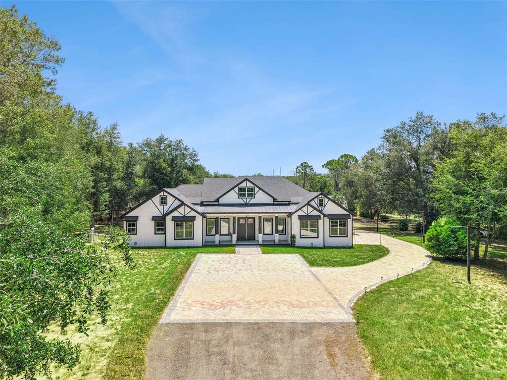 Photo of 7739 N Cherry Lake Groves Road, Groveland, FL 34736 (MLS # O6427283)