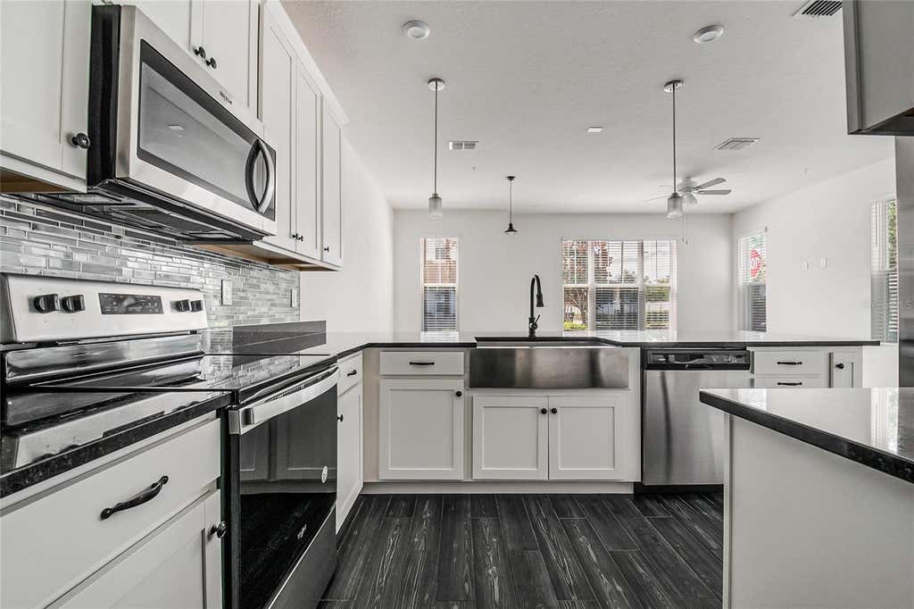 Photo of 9586 Poplar Ridge Avenue, Orlando, FL 32832 (MLS # O6416002)