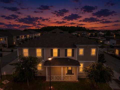 Photo of 9586 Poplar Ridge Avenue, Orlando, FL 32832 (MLS # O6416002)