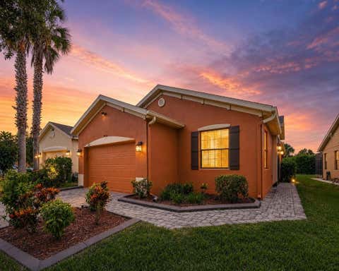 Photo of 505 Millifiora Lane, Kissimmee, FL 34759 (MLS # P4939099)