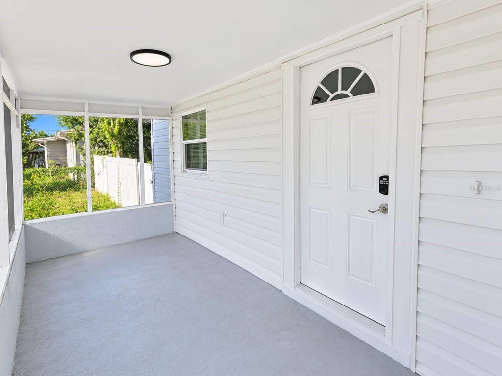 Photo of 10115 N 14th Street, Tampa, FL 33612 (MLS # TB8552715)