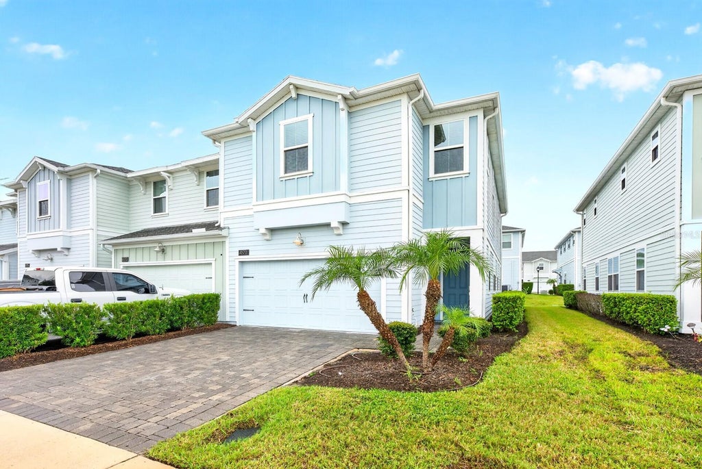 Photo of 4911 Tribute Trail, Kissimmee, FL 34746 (MLS # O6446579)