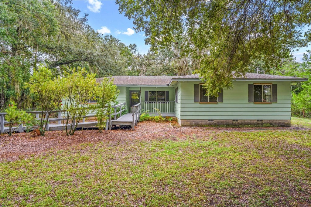 Photo of 3800 Chaplain Rd, Saint Cloud, FL 34772 (MLS # S5159487)